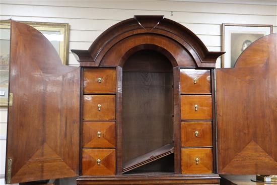 An 18th century German walnut bureau cabinet W.109cm